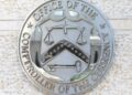 Community Bankers Sue US Banking Regulator Over ‘Side Door’ Crypto Charters